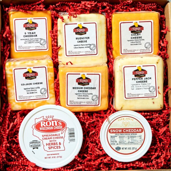 An array of cheese is a perfect gift for any cheese lover. Medium and 5 Year Cheddar, Muenster, Colby, Colby-Jack, and Pepper Jack block cheeses along with Herb's & Spice and Snow Cheddar Spread