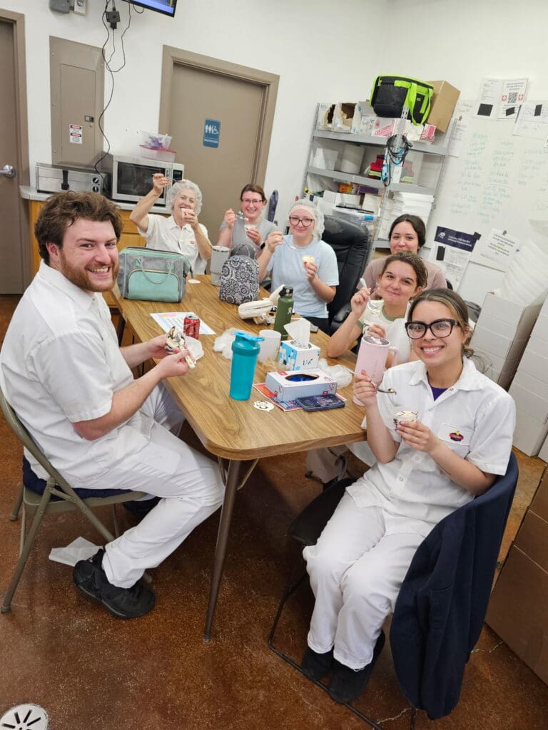 Rons cheese team enjoying ice cream